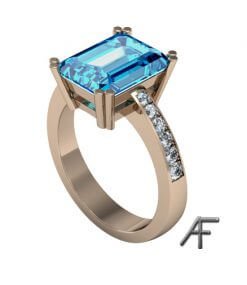 guldring med blå topas och diamanter