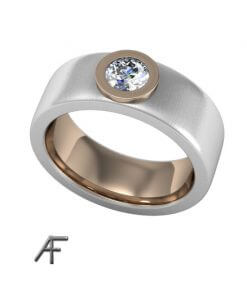 bred ring i rött och vitt guld med diamant